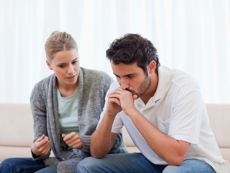 Man being mad at his fiance in their living room